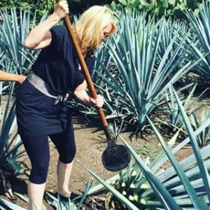 Leslie tending to Blue Weber Agave Plants in Mexico Tequila Trail